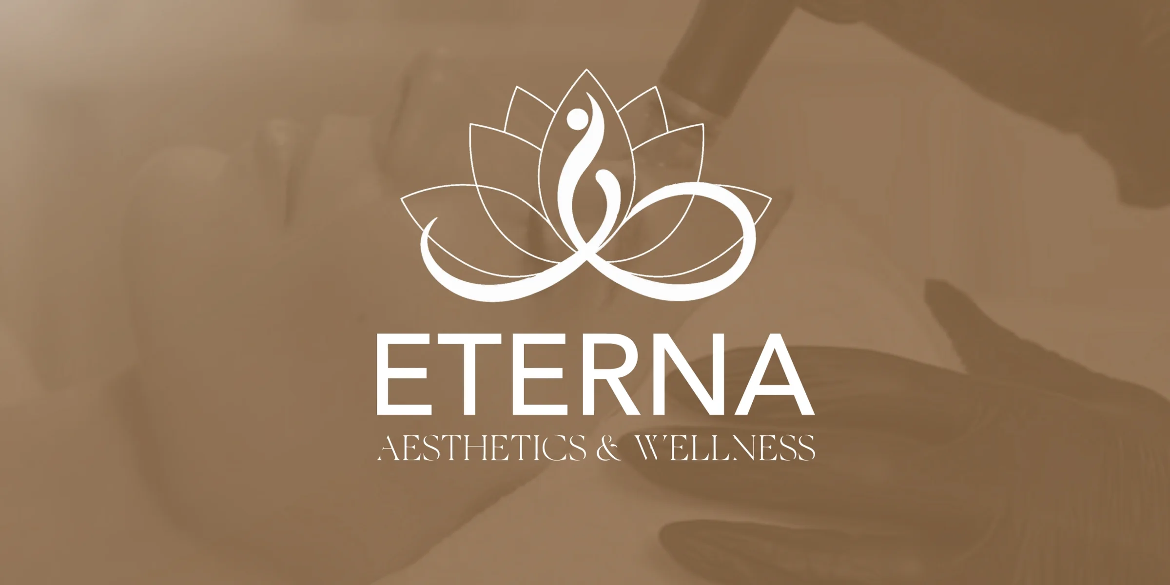 The Eterna logo — a white lotus mark and wordmark — on a solid warm brown background.